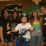 special needs child enjoying biking