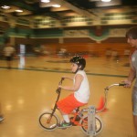 special needs child enjoying biking