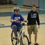 special needs child enjoying biking