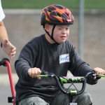 special needs child enjoying biking