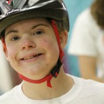 special needs child enjoying biking