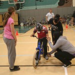 special needs child enjoying biking