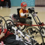 child with cerebral palsy enjoying biking