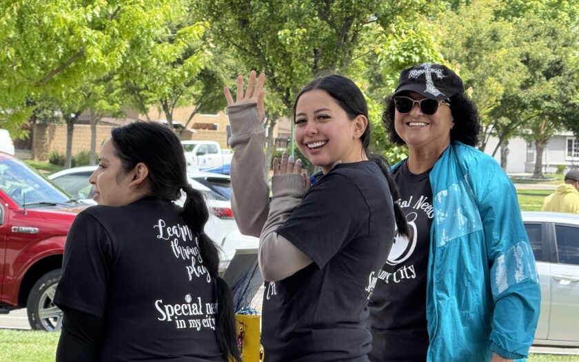 Volunteer saying hello at SNIMC Picnic